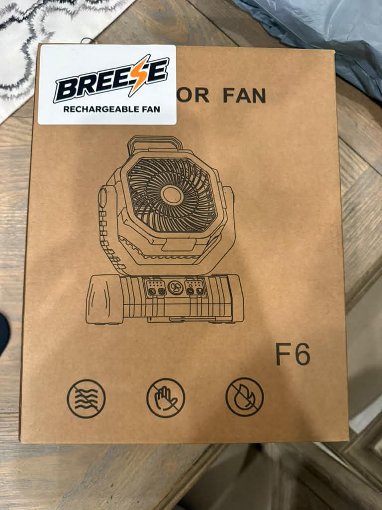 Rechargeable fan packaging with product details.